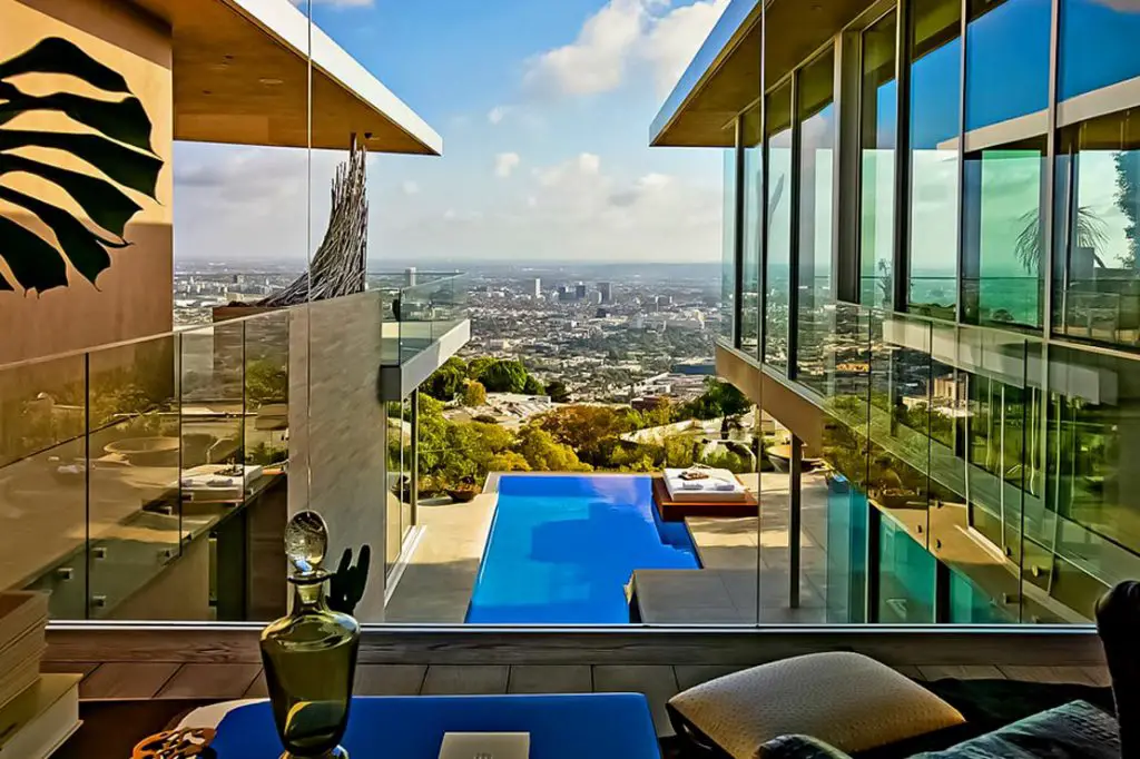 Avicii’s glass house sells in Hollywood, David Guetta buys